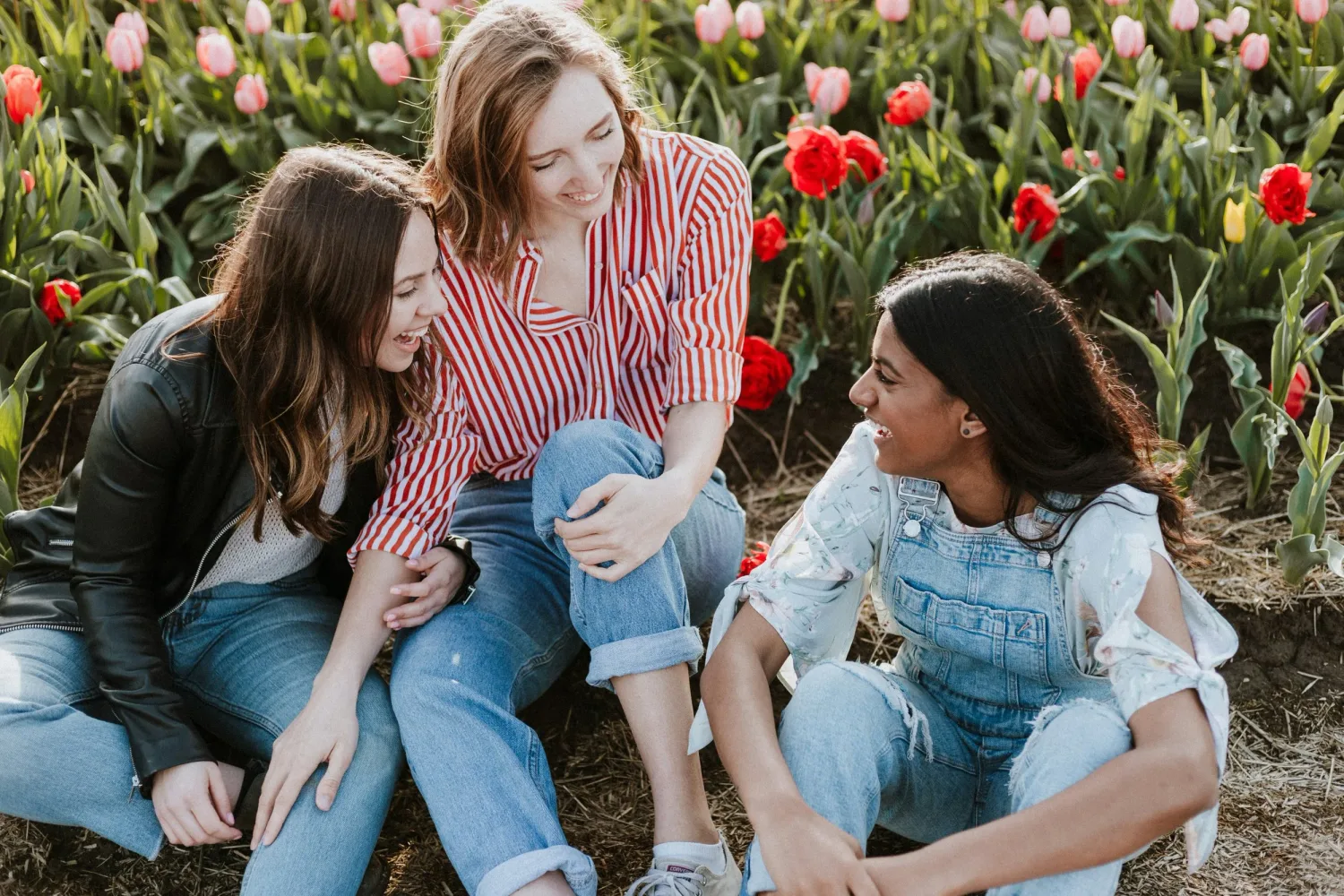 Woman in open field, reflective and present, representing the clarity CBT can help you find at Life Threads Therapy in West LA